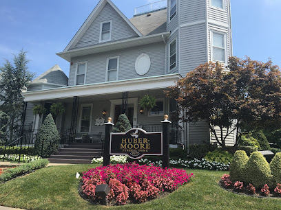 Huber Moore Funeral Home's logo